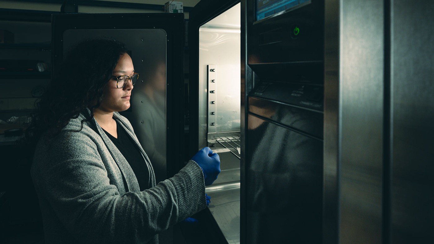 Students and researchers working together in a Purdue laboratory.